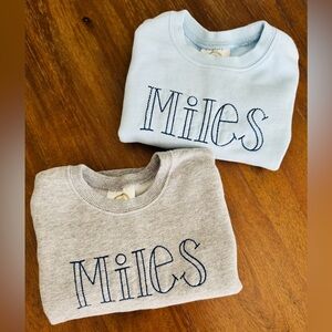 Set of two “Miles” embroidered sweatshirts. Both size 3T.